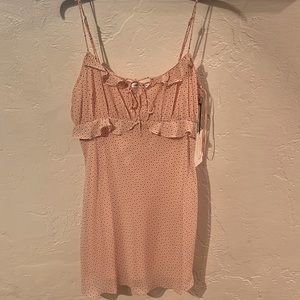 Never worn cute floral pink dress. Tags still on